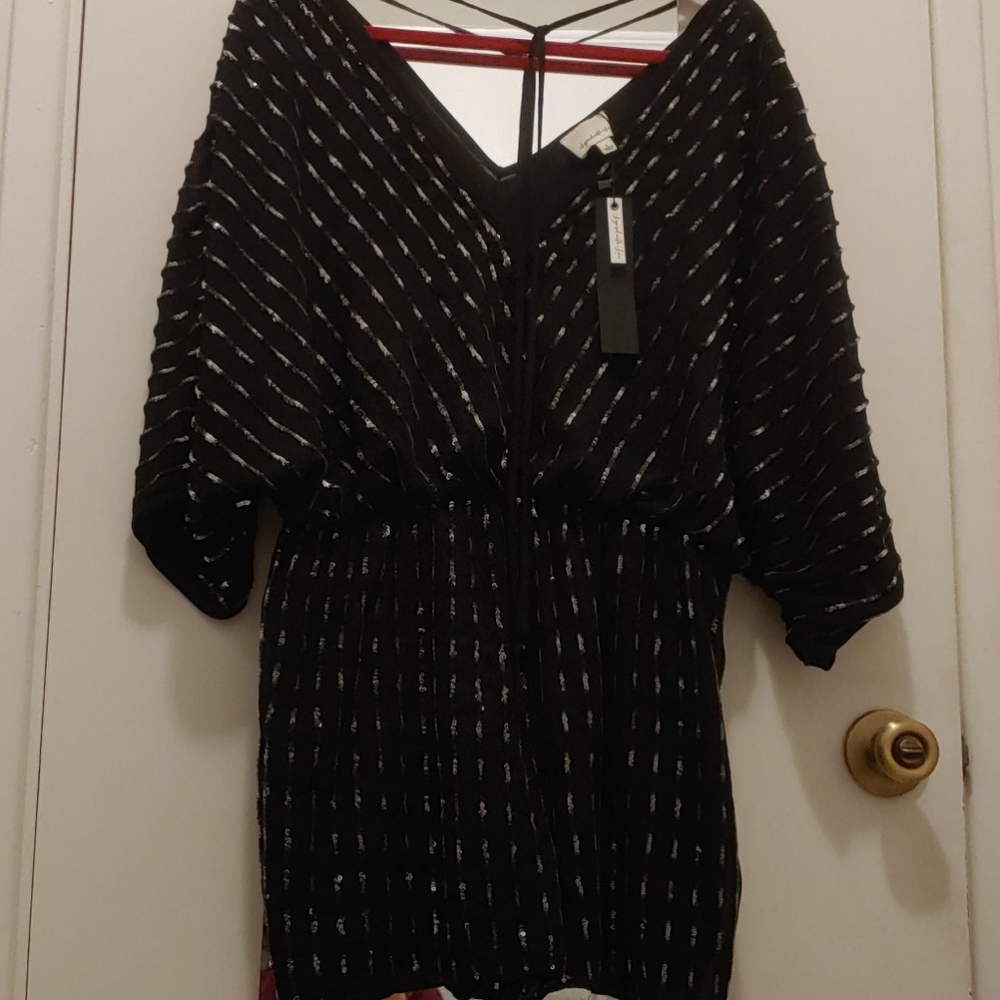 Layered with love sequined romper new with tags.